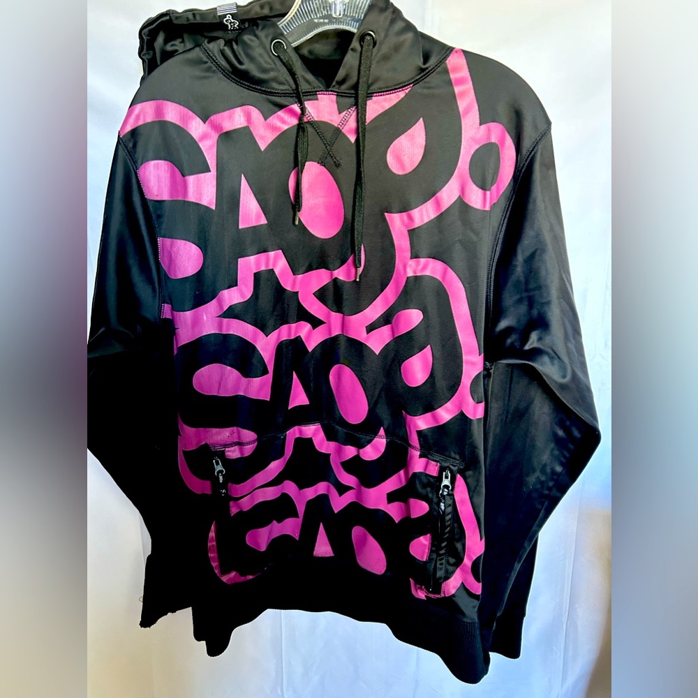 Word of Mouth SAGA hoodie. Black with purple/pink SAGA print. Sz M.